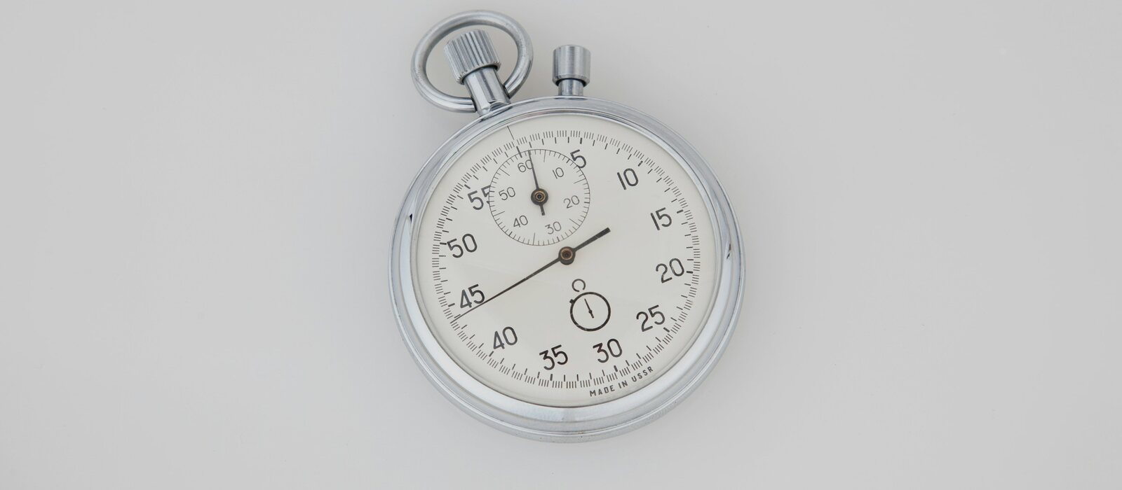 silver and white round analog watch