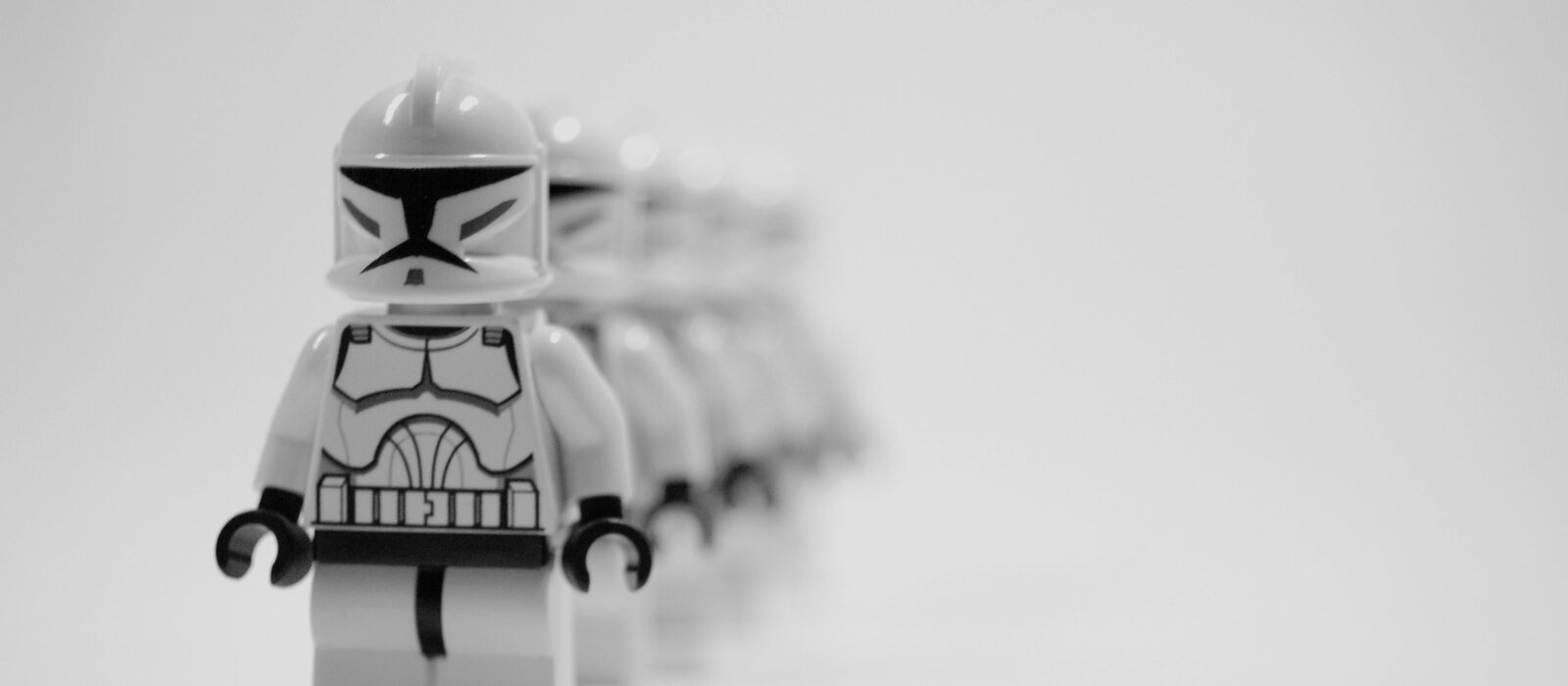 A row of lego star wars characters lined up
